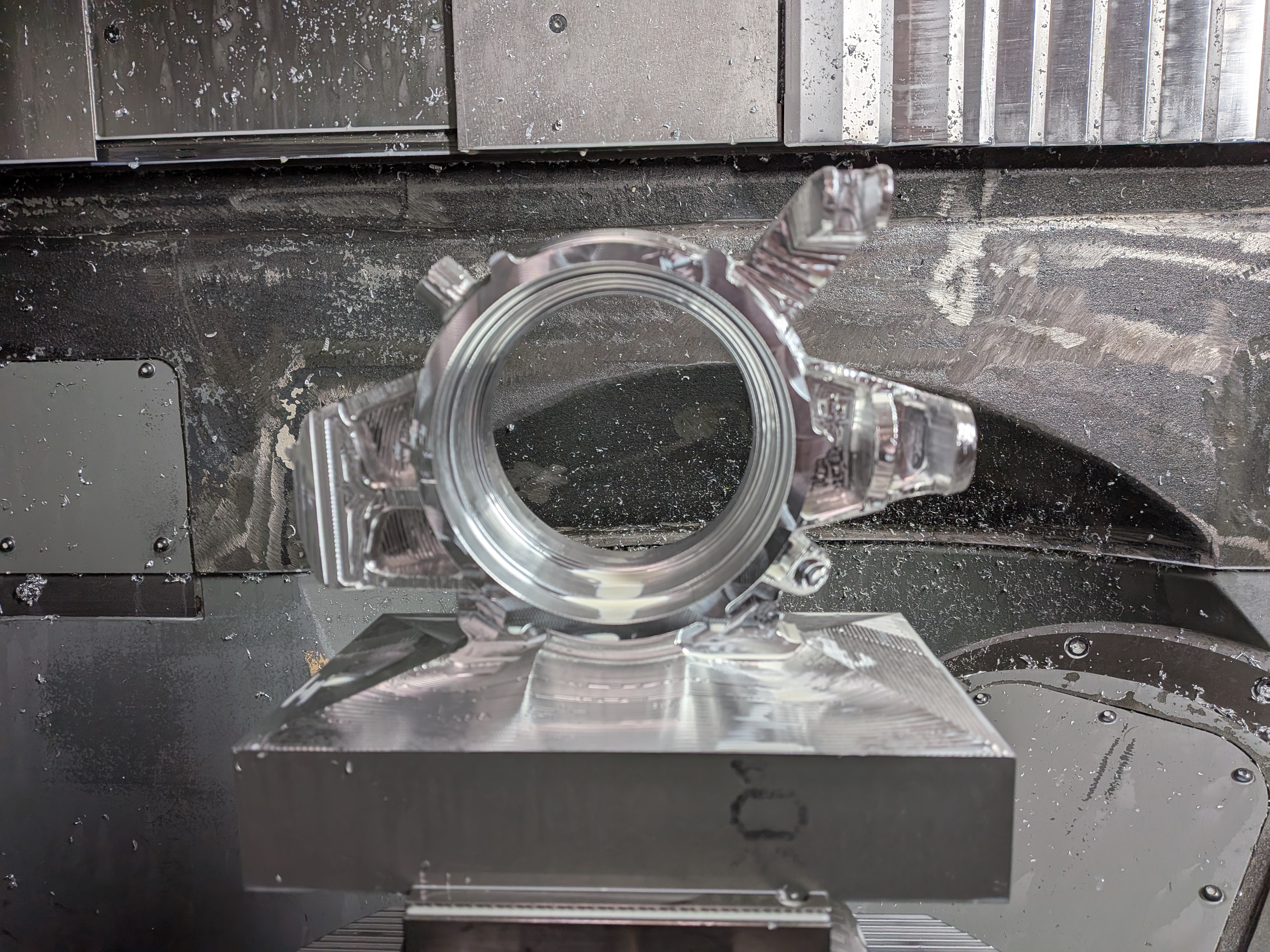Front upright billet being machined on a 5-axis CNC