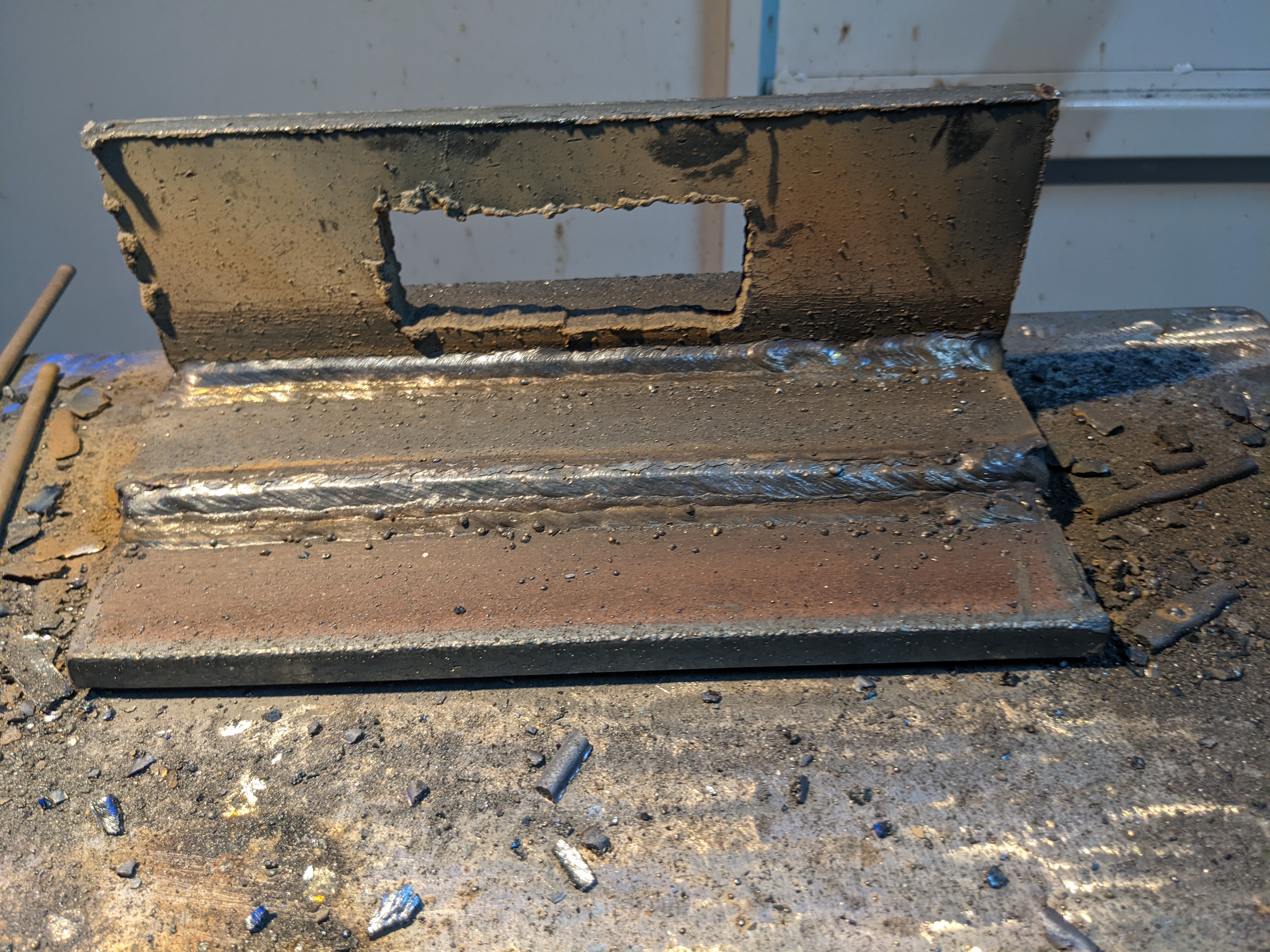 Weld beads on a steel practice piece